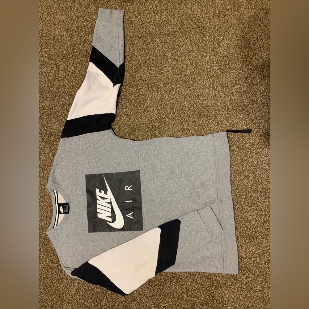 Women’s grey,black,and white Nike sweatshirt size small